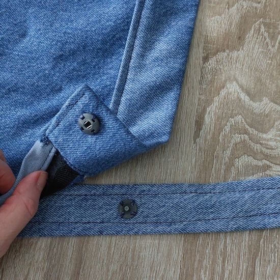 Vérifier que la lanière est correctement maintenue.